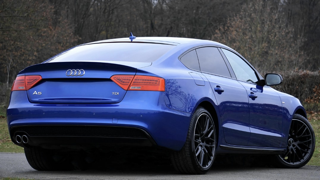 Blue Audi A5 showing rear view.png