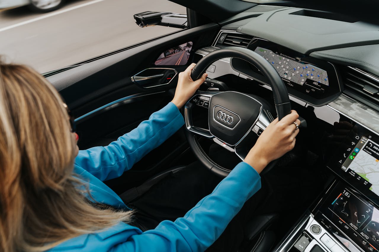 Woman%20Driving%20a%20New%20Audi%20Car.jpg