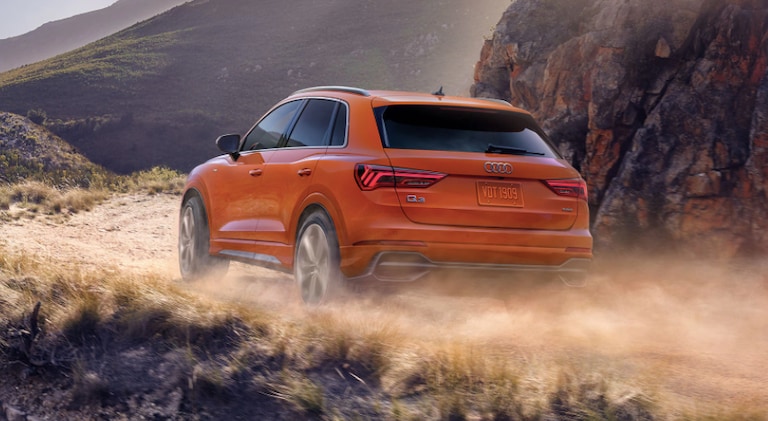 2022 Audi Q3 rear view driving on desert road