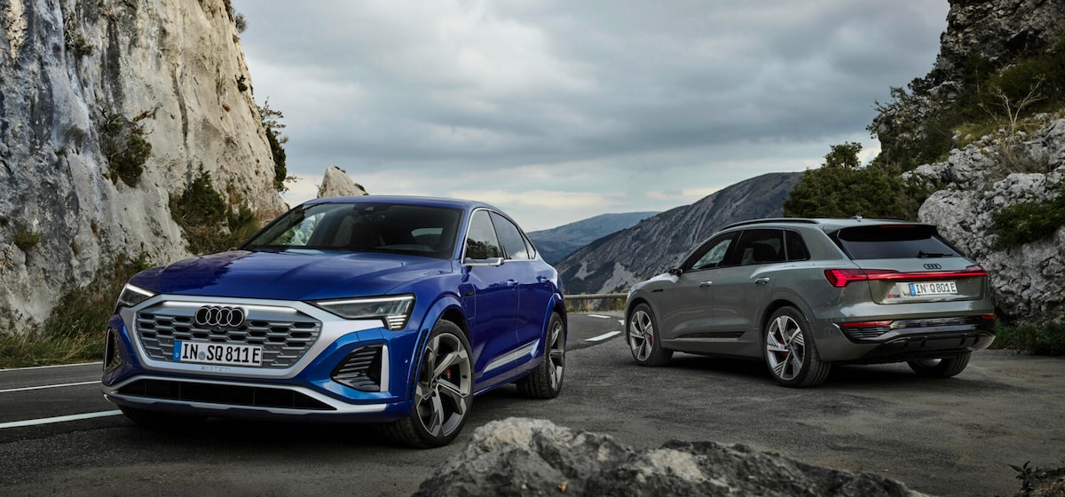 Two 2023 Audi Q8 e-tron rear view and front view