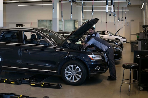 Audi Ontario Service Tech Working on Car