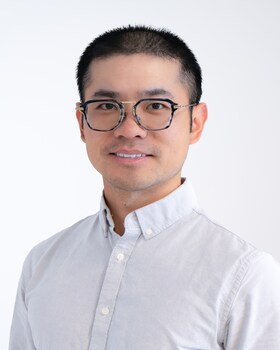 Staff member Clark Shen from e77dd838415a