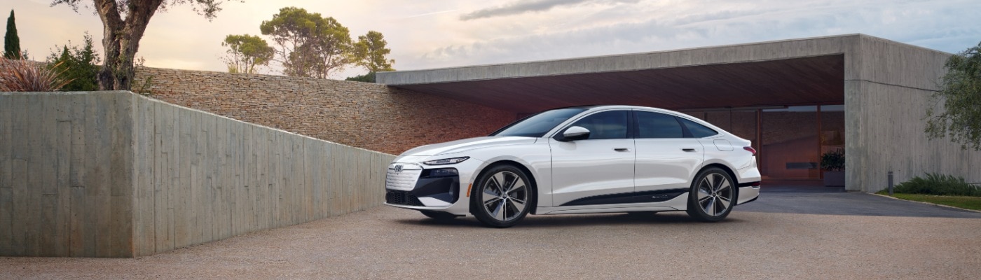 Audi A5 Sedan driving on a scenic highway