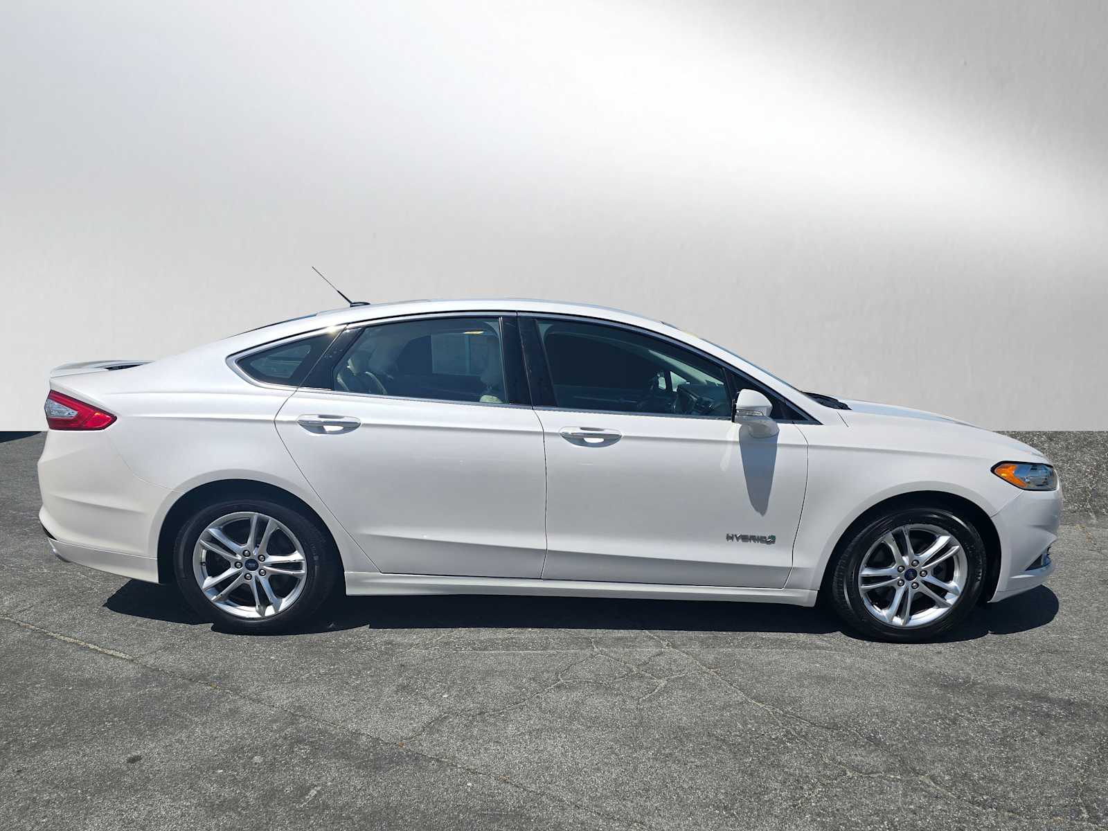 Used 2016 Ford Fusion Hybrid Titanium with VIN 3FA6P0RU7GR291379 for sale in Palo Alto, CA