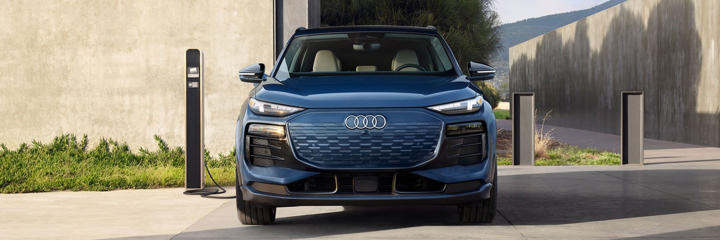 Q6 e-tron Audi Q6 e-tron parked at charging station