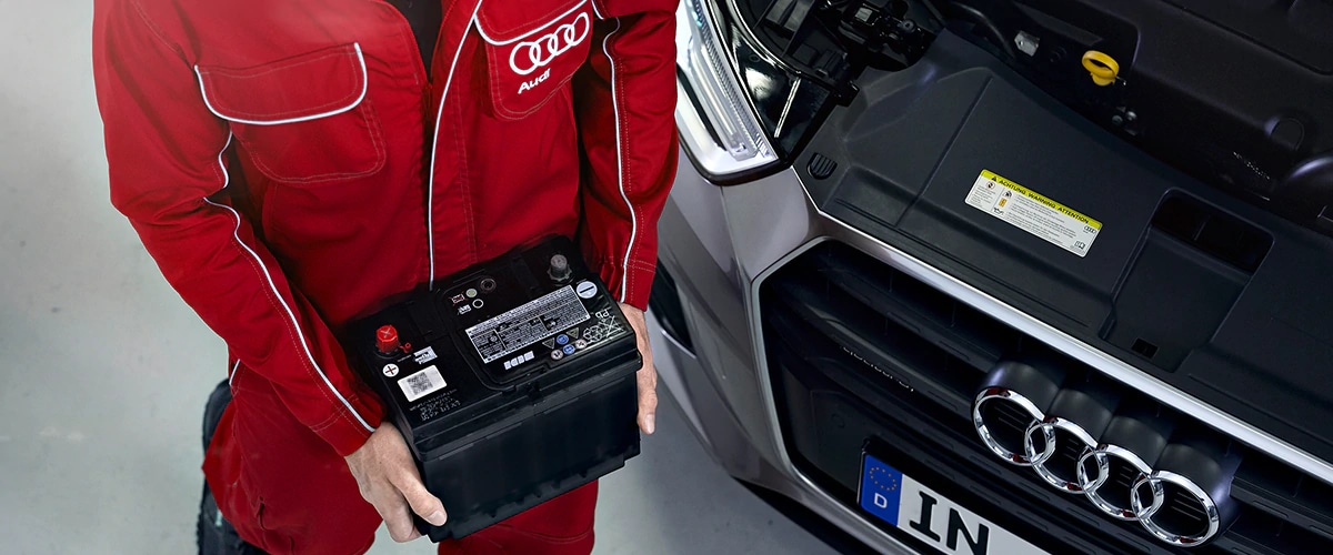Audi Pensacola Mechanic Replacing a Battery in Pensacola, FL