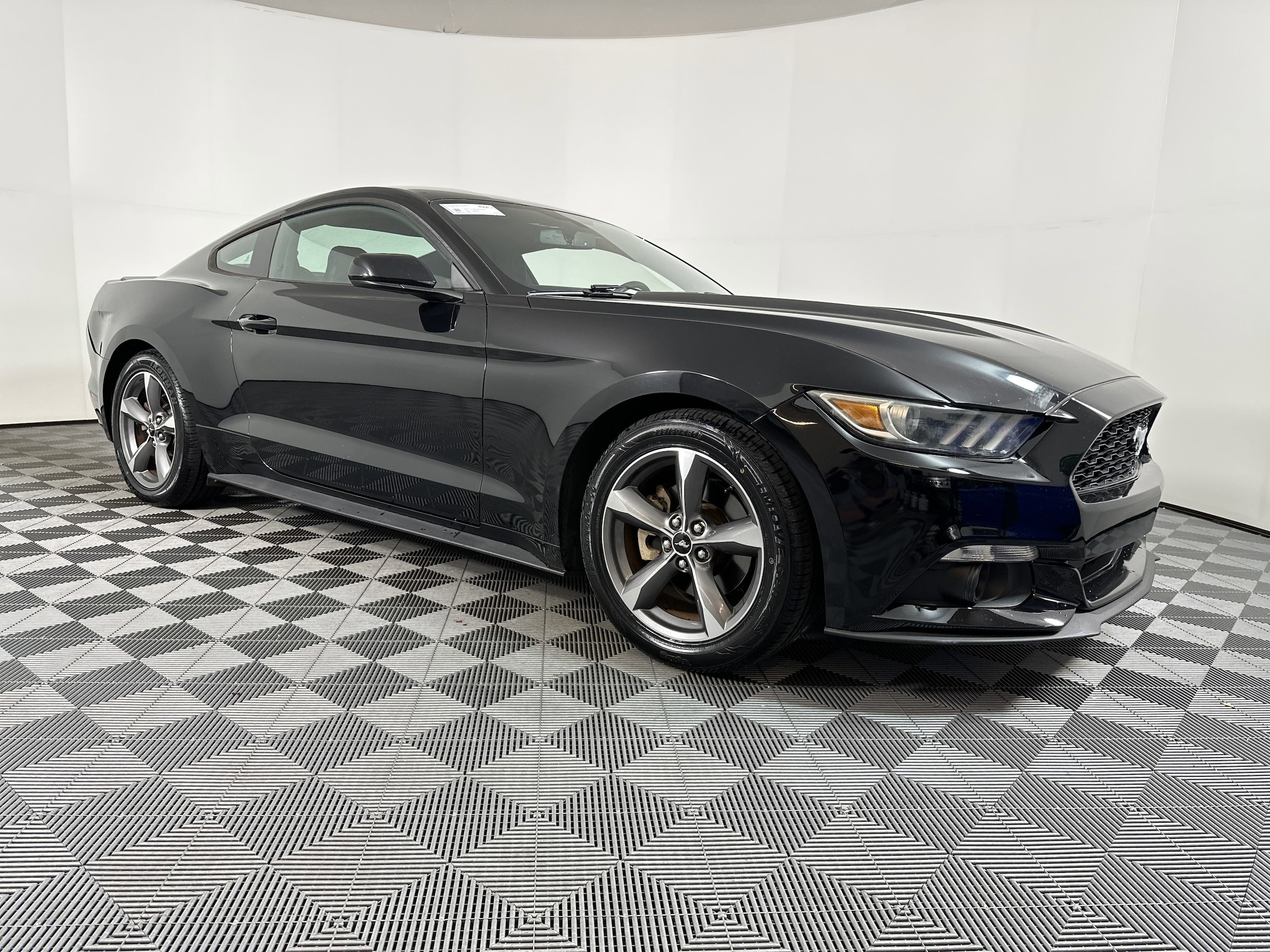Used 2016 Ford Mustang V6 with VIN 1FA6P8AM7G5228117 for sale in Pensacola, FL