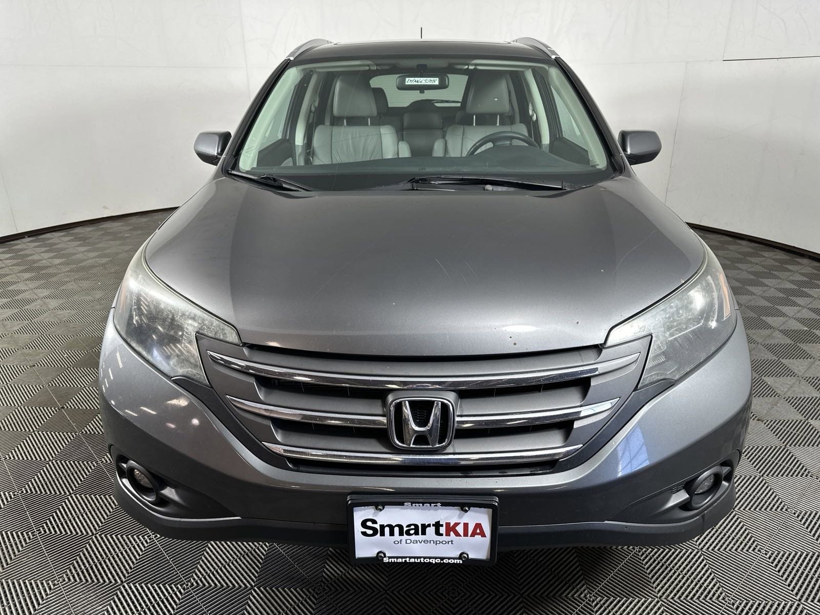 Used 2014 Honda CR-V EX-L with VIN 2HKRM4H78EH663248 for sale in Davenport, IA
