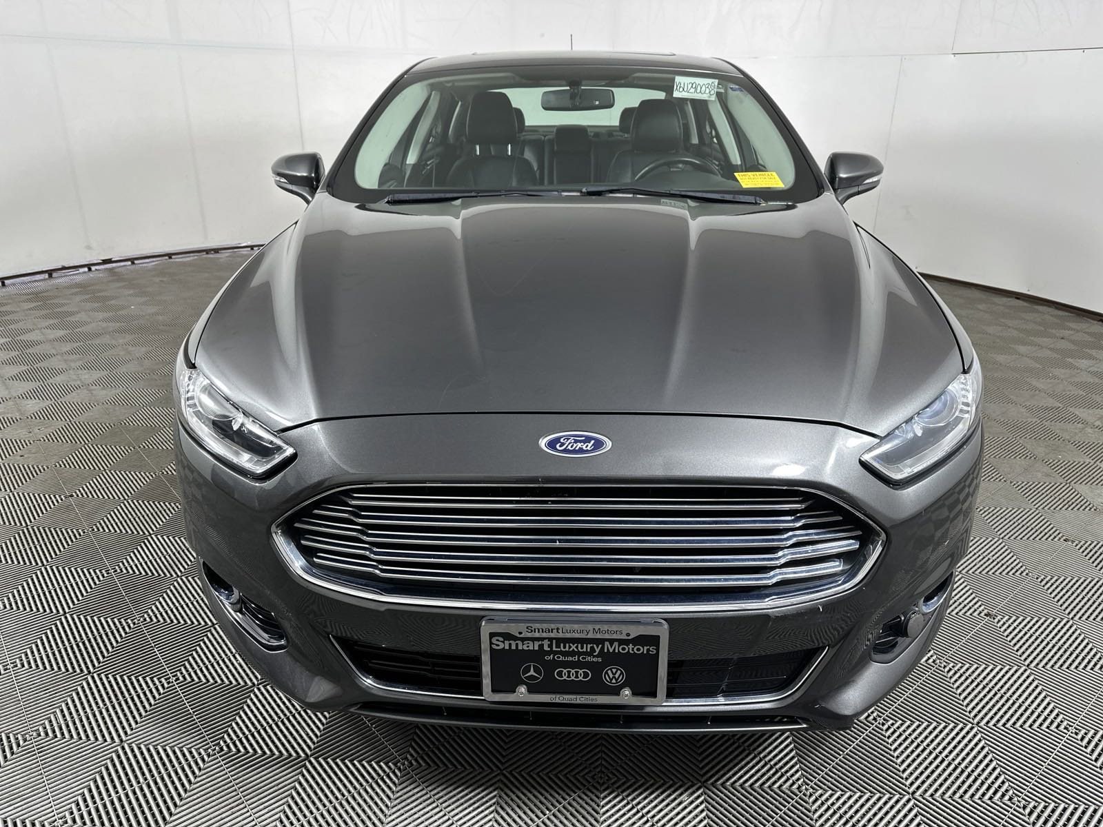 Used 2015 Ford Fusion Energi Titanium with VIN 3FA6P0SU8FR290038 for sale in Davenport, IA