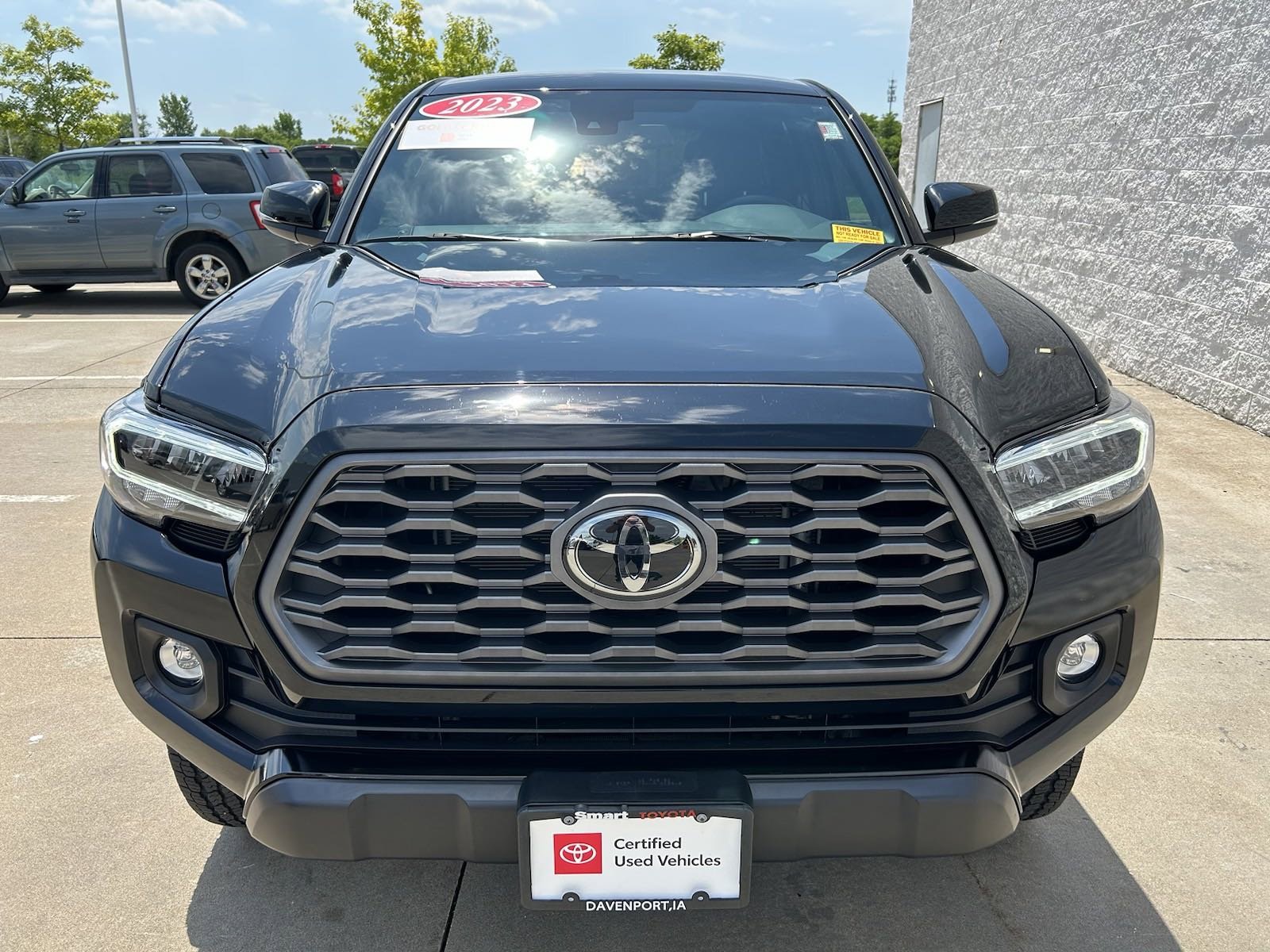 Used 2023 Toyota Tacoma TRD Off Road with VIN 3TMCZ5ANXPM552297 for sale in Davenport, IA