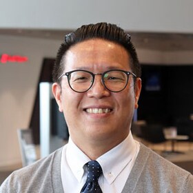 Staff member George Lu from 37d720303277
