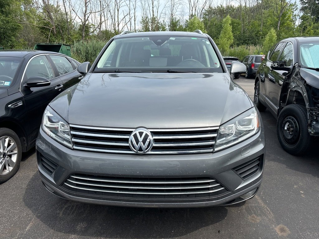 Used 2016 Volkswagen Touareg Sport with VIN WVGEF9BP1GD012319 for sale in Rochester, NY