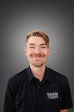 Staff member Travis Wolf from ID_76a158118092