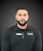 Staff member Alexander Cruz from ID_76a158118092