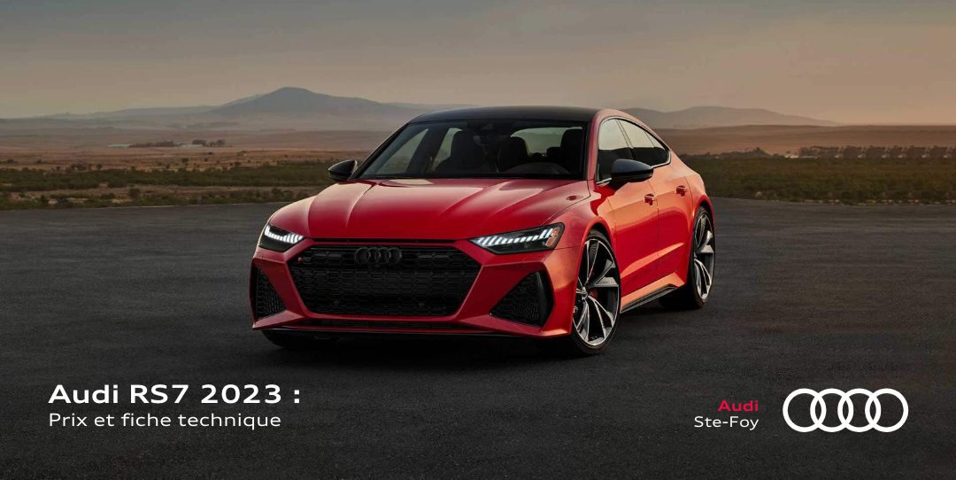 Vue 3/4 avant de la Audi RS7 2023 rouge garée à l'extérieur