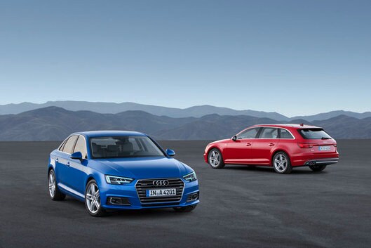vue 3/4 avant de la berline Audi A4 2019 et 3/4 arrière de la A4 avant 2019