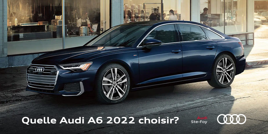 vue latérale avant d'une Audi A6 stationnée devant un commerce