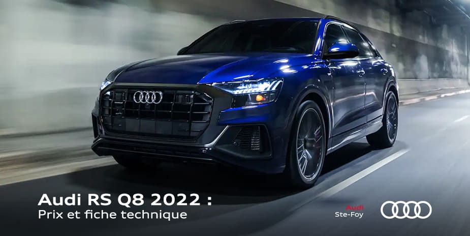 vue latérale avant d'une Audi RS Q8 2022 sur la route dans un tunnel