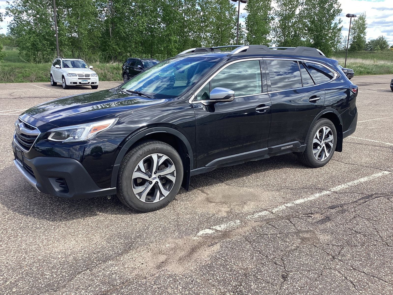 Used 2021 Subaru Outback Touring with VIN 4S4BTAPC2M3111428 for sale in Saint Paul, Minnesota