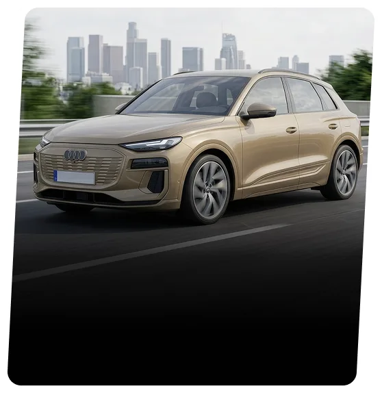 Gold Audi electric SUV driving on a highway with a city skyline behind