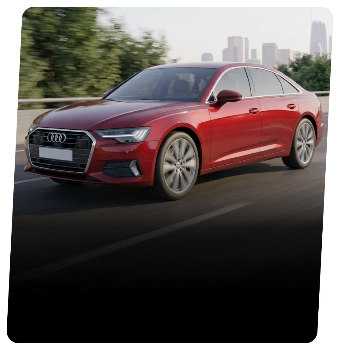 Red Audi sedan driving on a highway lined with trees