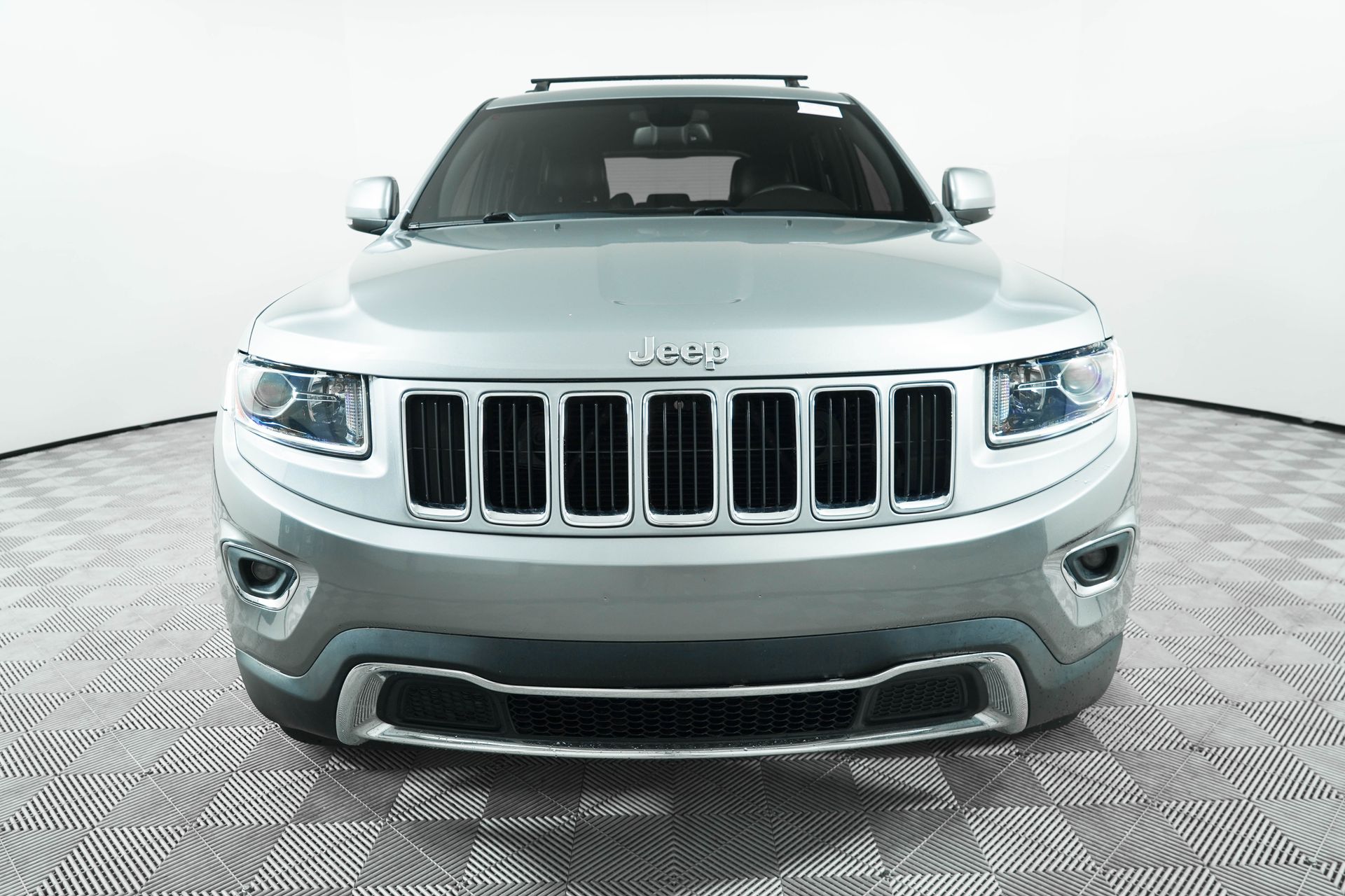 Used 2014 Jeep Grand Cherokee Limited with VIN 1C4RJEBGXEC418910 for sale in Stuart, FL