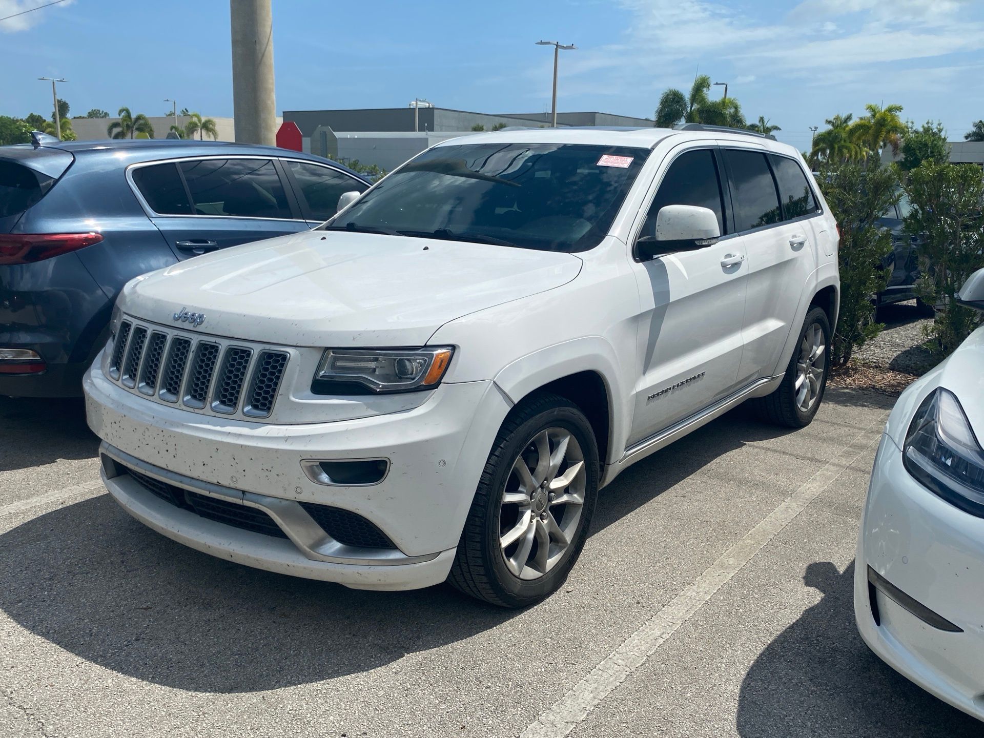 Used 2015 Jeep Grand Cherokee Summit with VIN 1C4RJFJG0FC609938 for sale in Stuart, FL