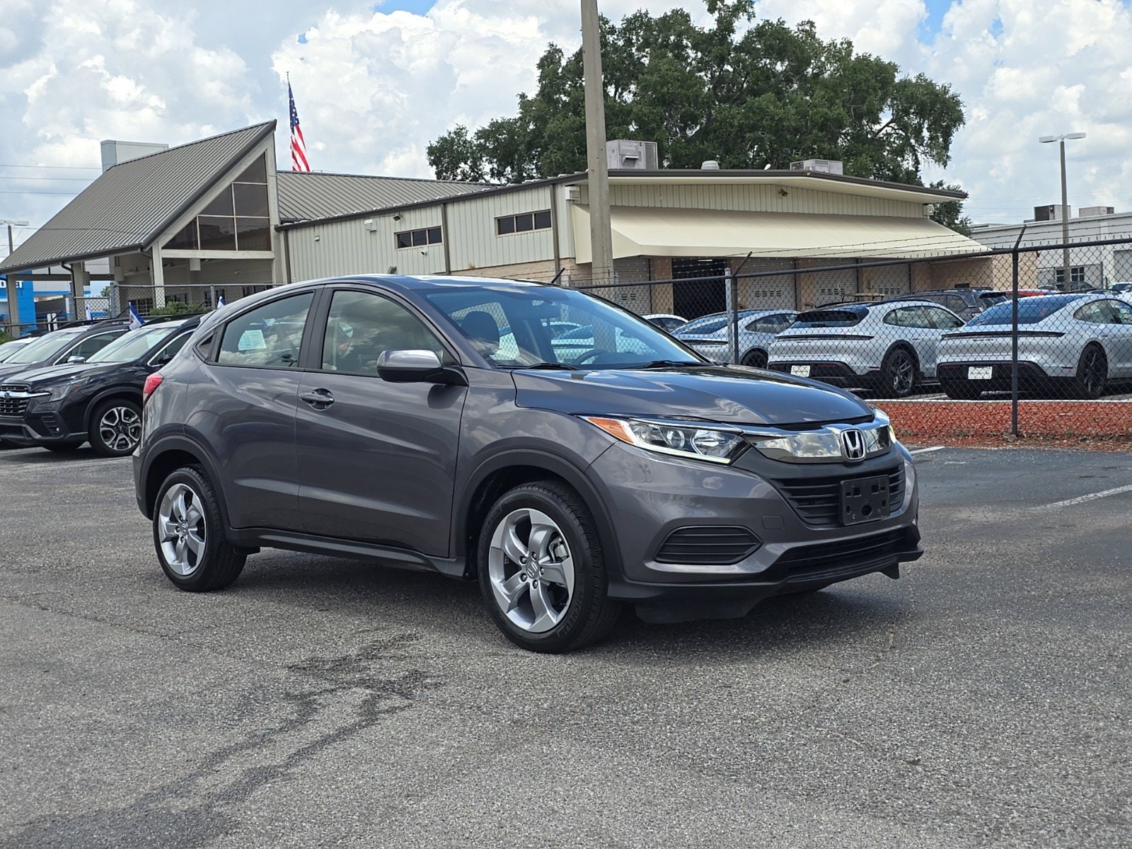 Used 2021 Honda HR-V LX with VIN 3CZRU5H37MM718875 for sale in Tampa, FL