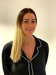 Staff member April Popovski from 69c1cf19492f