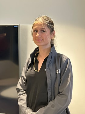 Staff member Melika Mortazavi from 6d7883f21a7b
