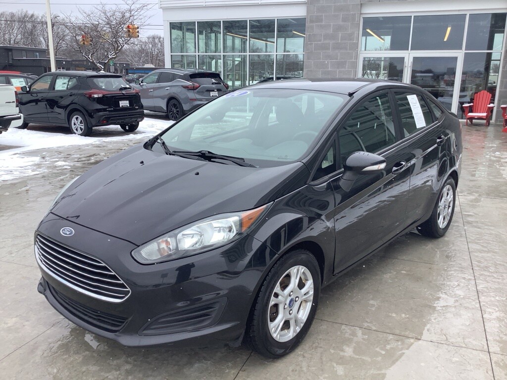 Used 2014 Ford Fiesta SE with VIN 3FADP4BJ1EM139381 for sale in Traverse City, MI