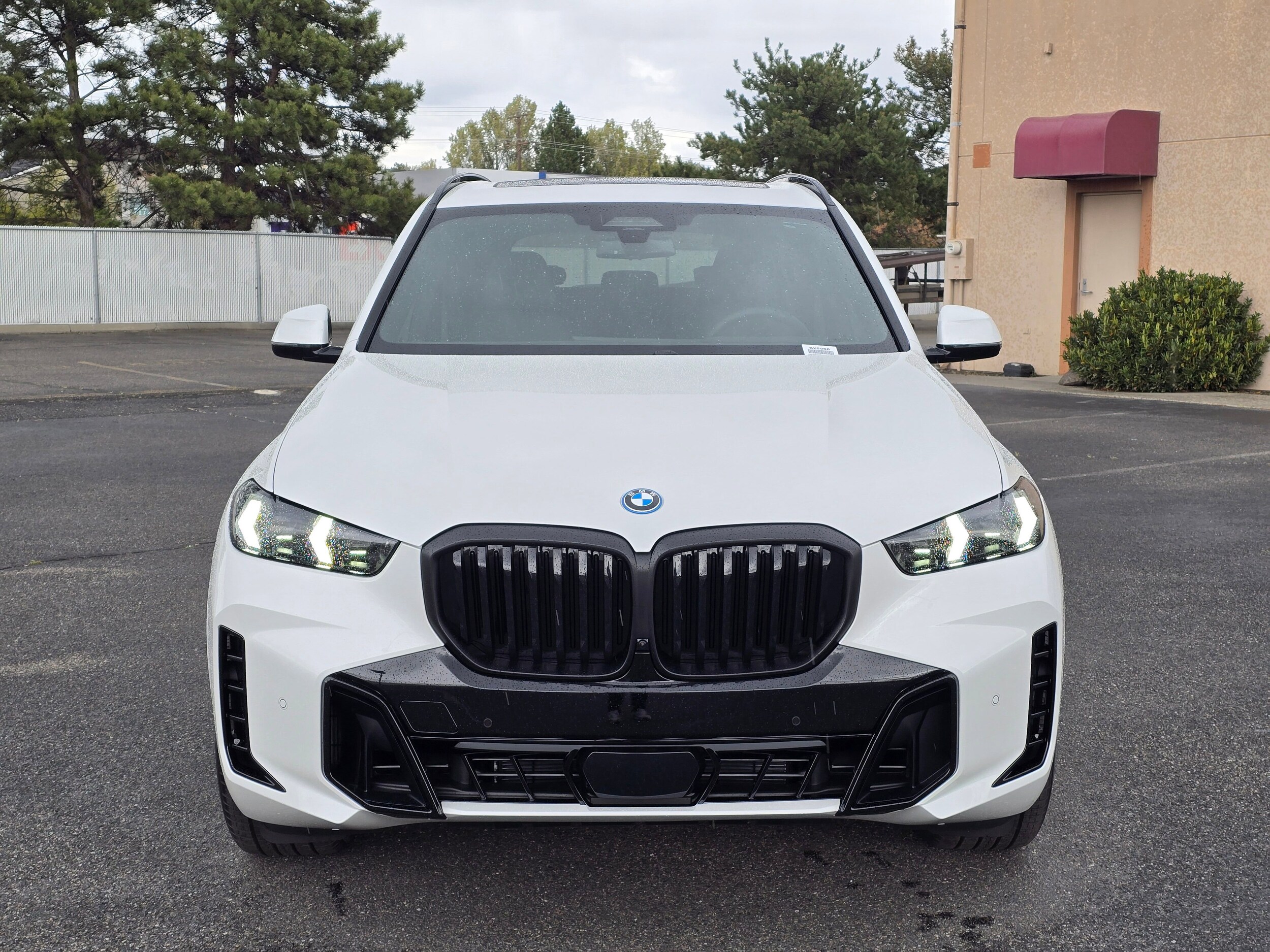 Used 2026 Mineral White Metallic BMW xDrive50e image 38