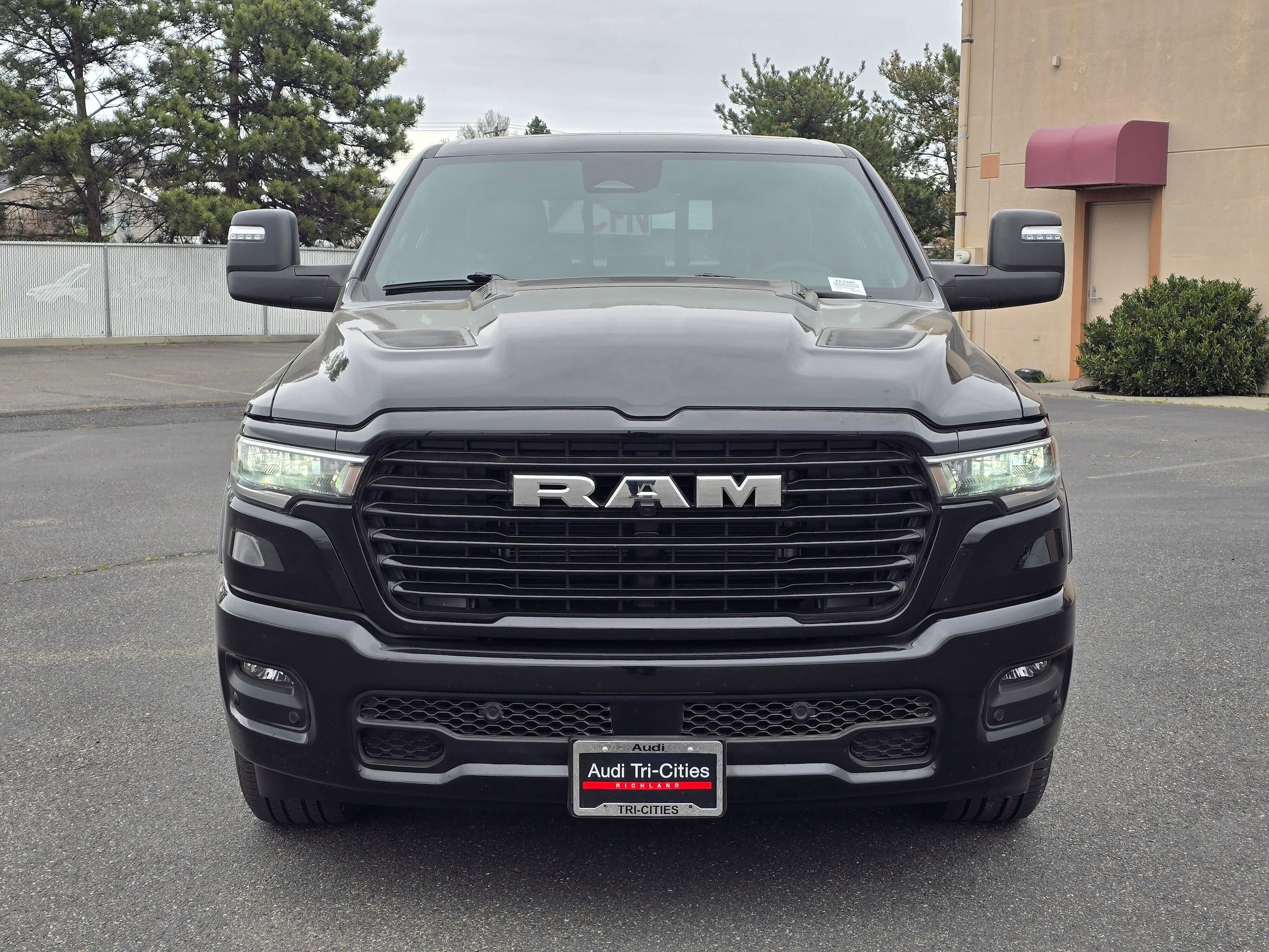 Used 2025 Diamond Black Crystal Pearlcoat Ram Laramie image 6