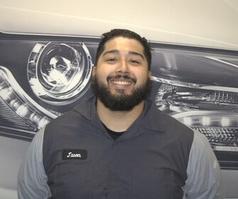Staff member Jason Guzman from ID_38db4abfc1a4