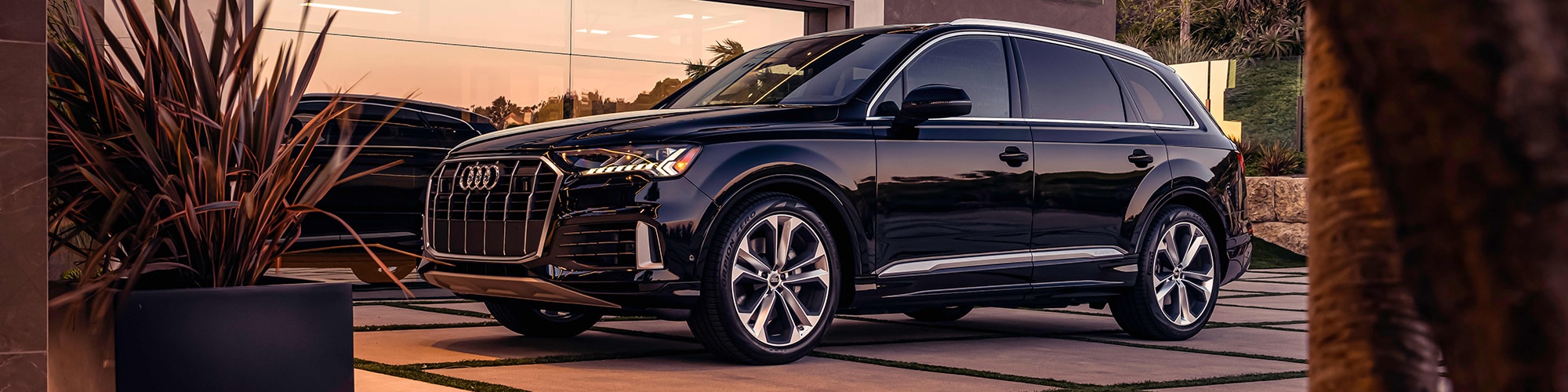 Front of the New Audi Q7 parked.