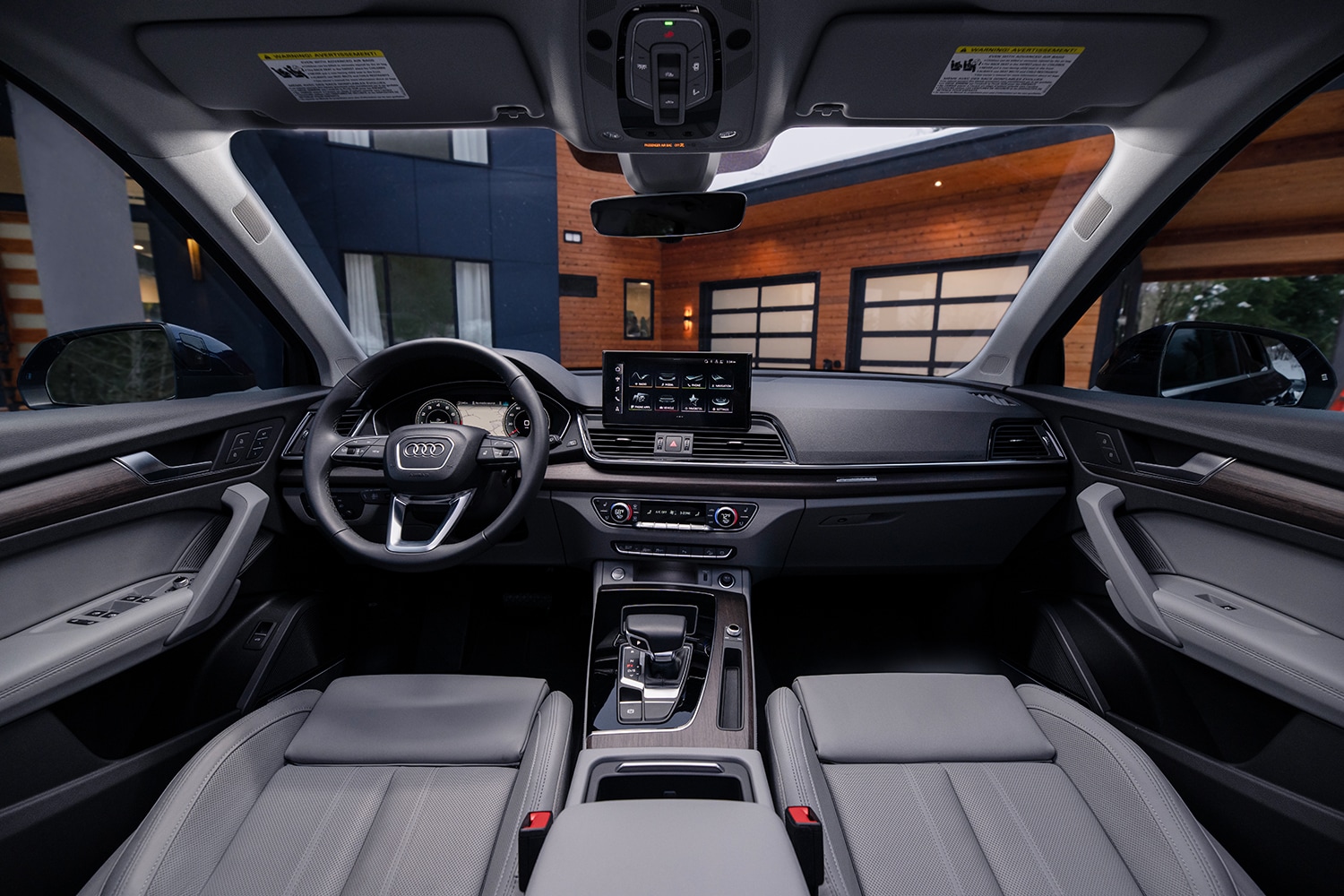 Steering wheel, dashboard and front seats of a new 2023 Audi Q5.