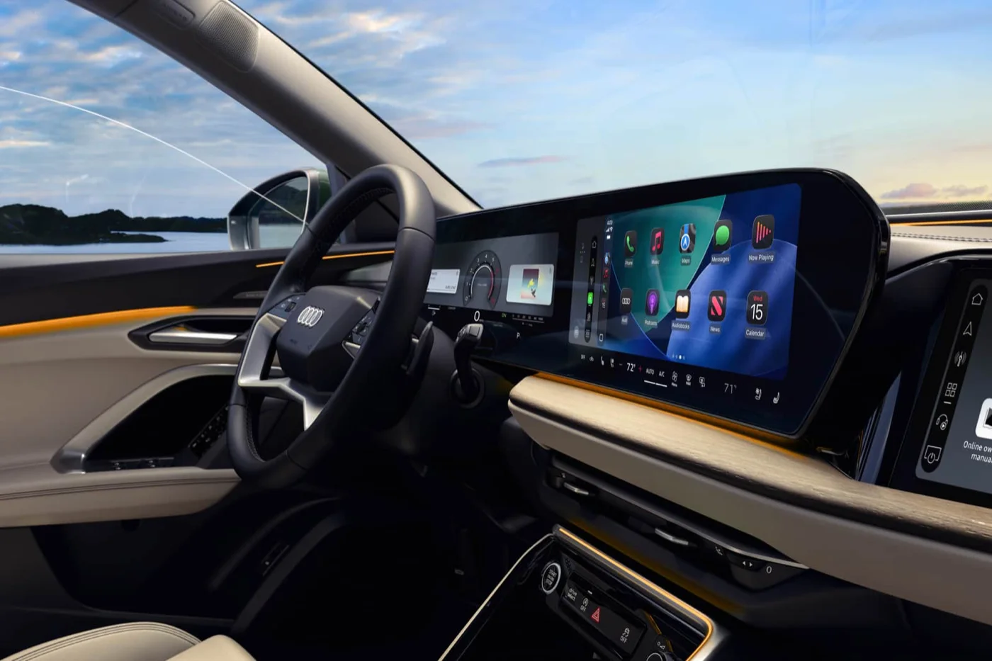 2026 Audi Q5 MMI touch display and curved digital stage lit at dusk