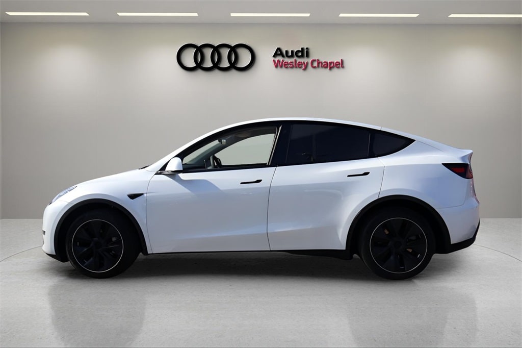 Used 2023 Tesla Model Y Long Range with VIN 7SAYGDEE5PA082927 for sale in Wesley Chapel, FL