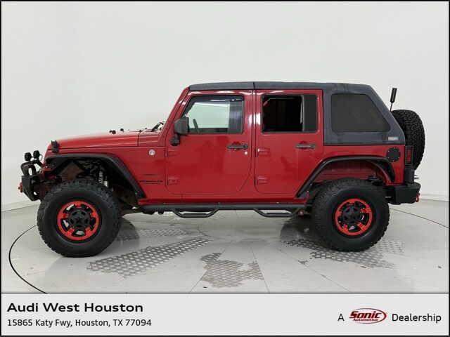 Used 2014 Jeep Wrangler Unlimited Sport SUV for sale in Houston
