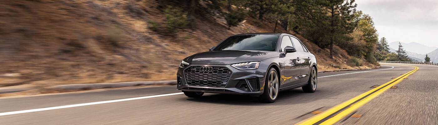 Audi A4 driving in a dry climate