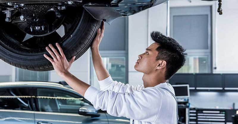 Technician changing tire