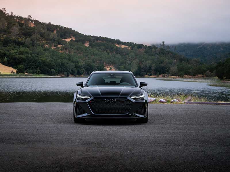 2024 Audi RS 6 Avant Performance rear view near lake