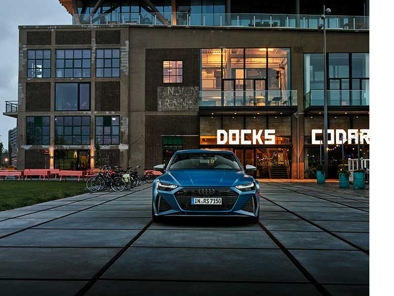2024 Audi RS 7 Sportback Performance front view by city building