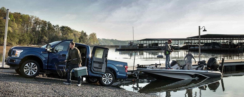 2018 Ford F-150 STX in Lightning Blue towing