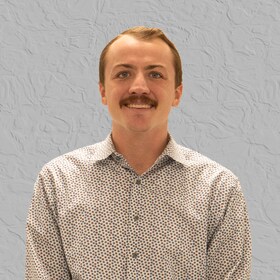 Staff member Nicholas Trelow from ID_75d4fac39601