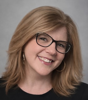 Staff member Jennifer Koulalis from 373b7fc186e4