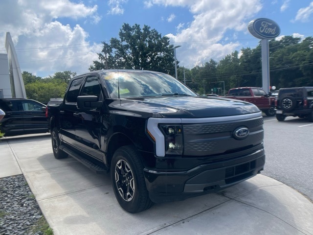 Certified 2023 Ford F-150 Lightning XLT with VIN 1FTVW1EL4PWG39941 for sale in Haverhill, MA