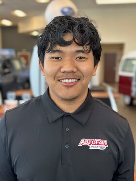 Staff member Kap Suum from ID_a5e91998f809