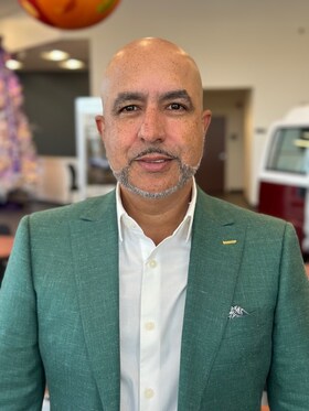 Staff member Rudy Espinal from ID_a5e91998f809