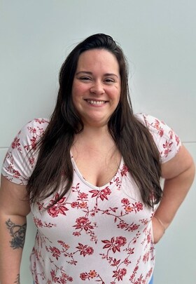 Staff member Amelia Torres from ID_999ac8e13176